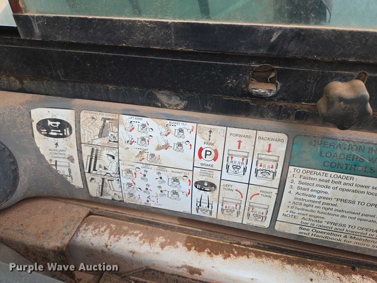 image for item ET1010 2002 Bobcat 873 skid steer loader