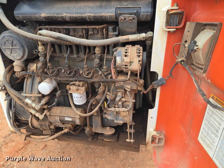 image for item ET1010 2002 Bobcat 873 skid steer loader