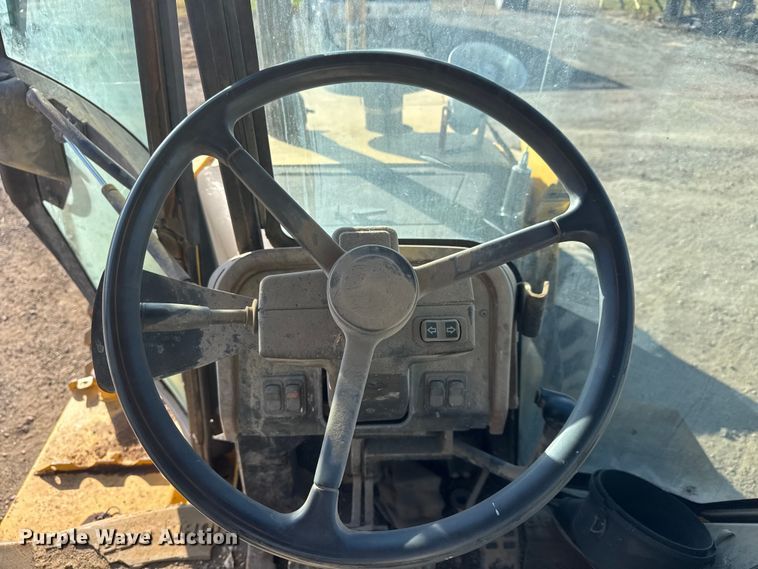 image for item ET4088 1998 John Deere 310SE tractor