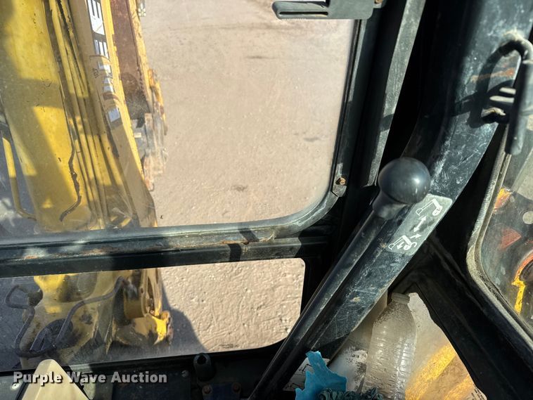 image for item ET4088 1998 John Deere 310SE tractor