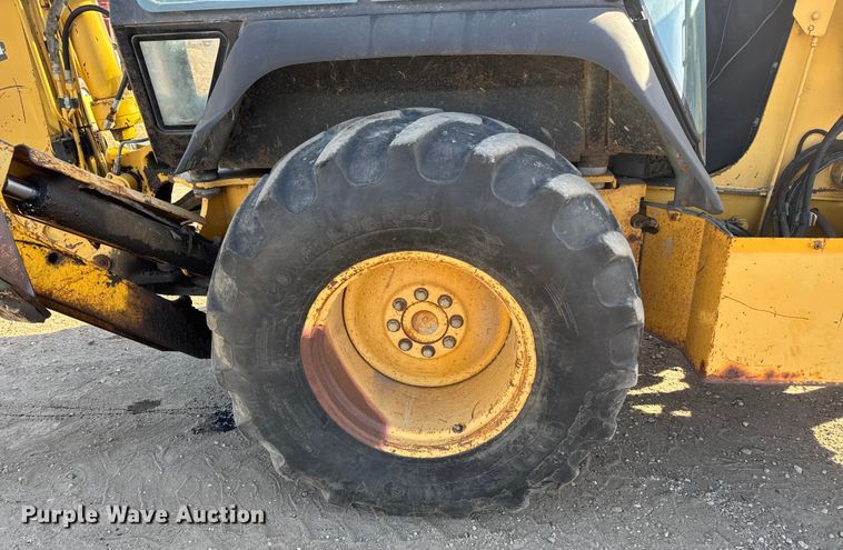 image for item ET4088 1998 John Deere 310SE tractor