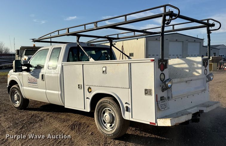 image for item ET4090 2013 Ford F350 Super Duty Ext. Cab utility bed pickup truck