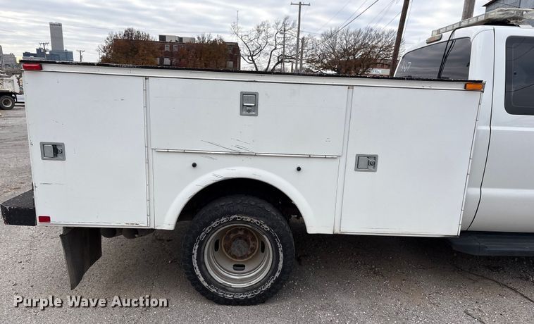 image for item FB8506 2014 Ford F350 Super Duty Ext. Cab utility bed pickup truck