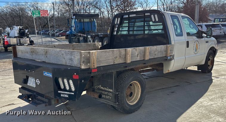 image for item FG1705 2001 Ford F350 Super Duty Ext. Cab flatbed pickup truck
