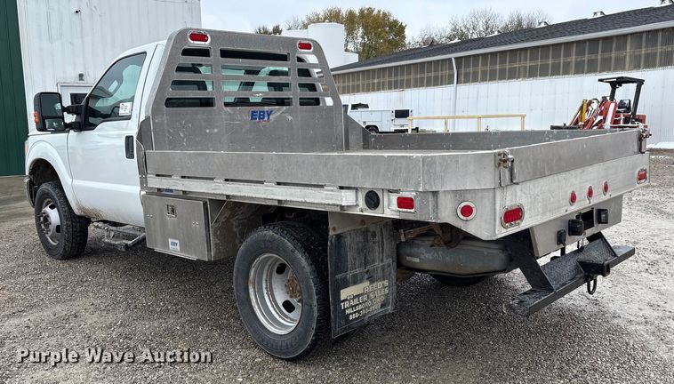 image for item FK1023 2015 Ford F350 Super Duty flatbed pickup truck