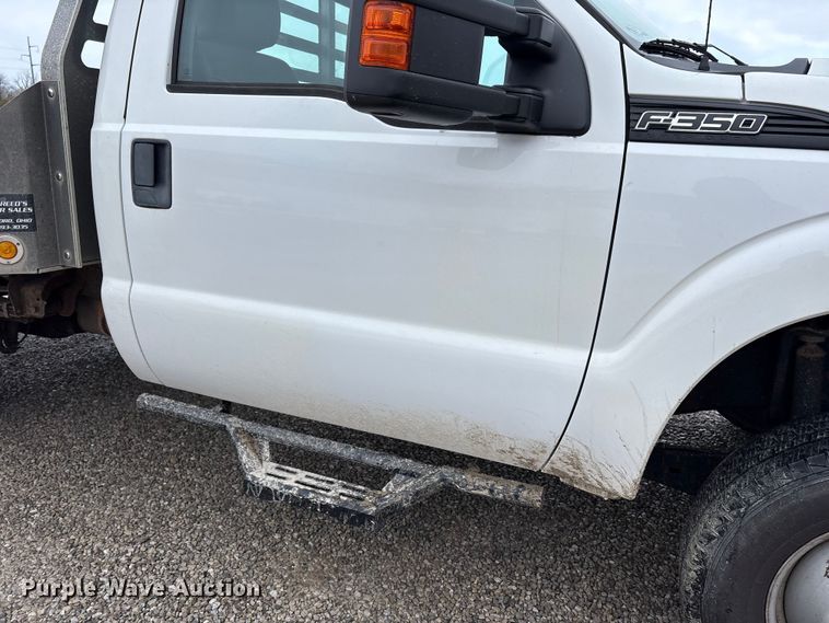 image for item FK1023 2015 Ford F350 Super Duty flatbed pickup truck