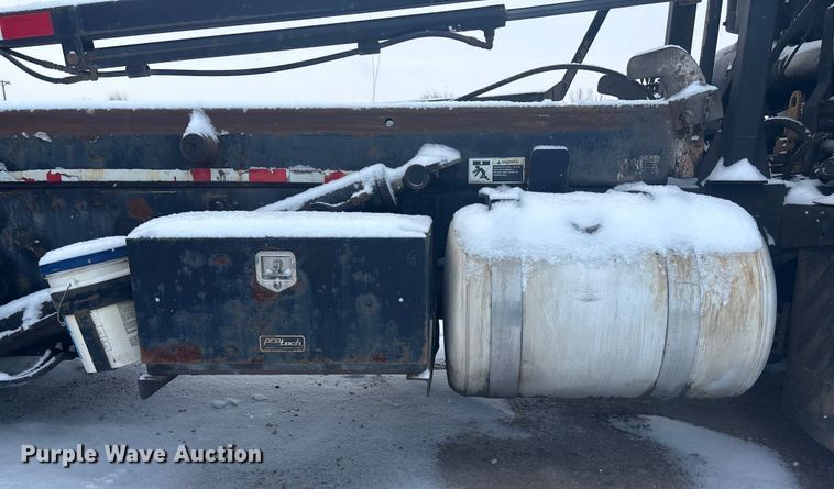 image for item DK0202 2002 Peterbilt 320 roll-off container truck