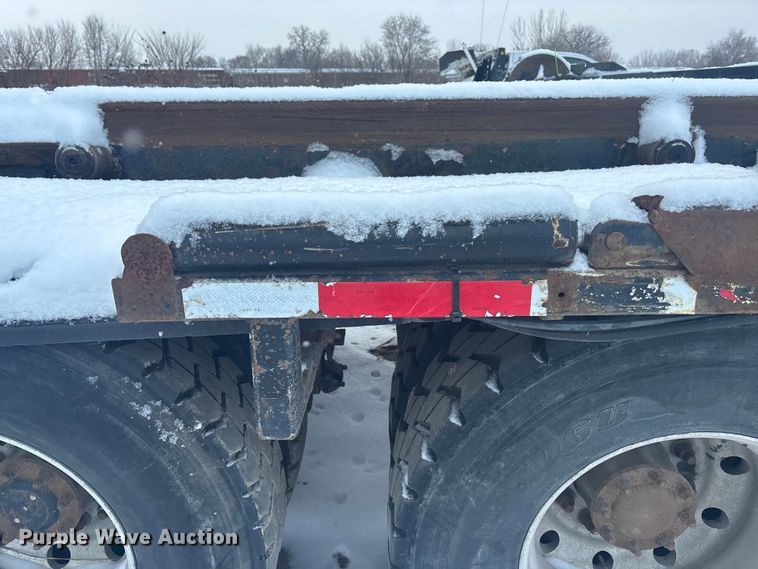 image for item DK0202 2002 Peterbilt 320 roll-off container truck