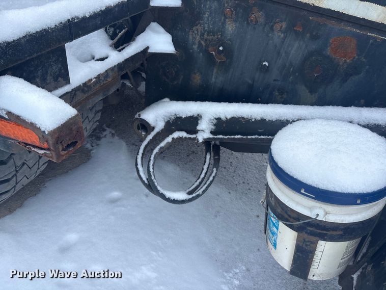 image for item DK0202 2002 Peterbilt 320 roll-off container truck