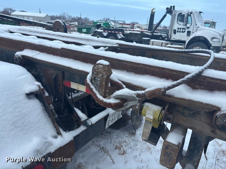 image for item DK0202 2002 Peterbilt 320 roll-off container truck