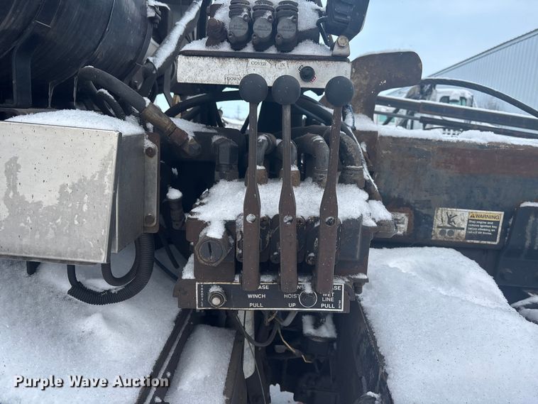 image for item DK0202 2002 Peterbilt 320 roll-off container truck