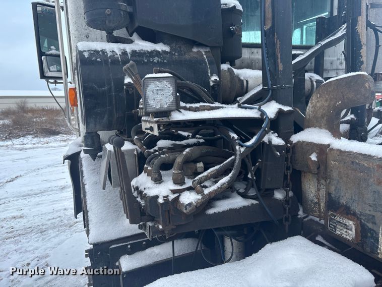 image for item DK0202 2002 Peterbilt 320 roll-off container truck