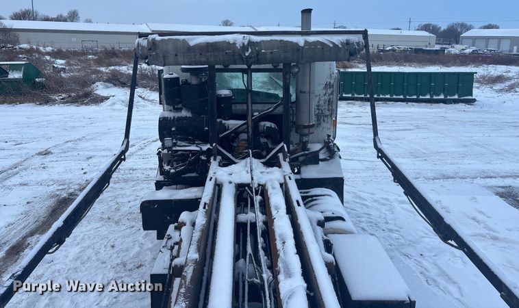 image for item DK0202 2002 Peterbilt 320 roll-off container truck