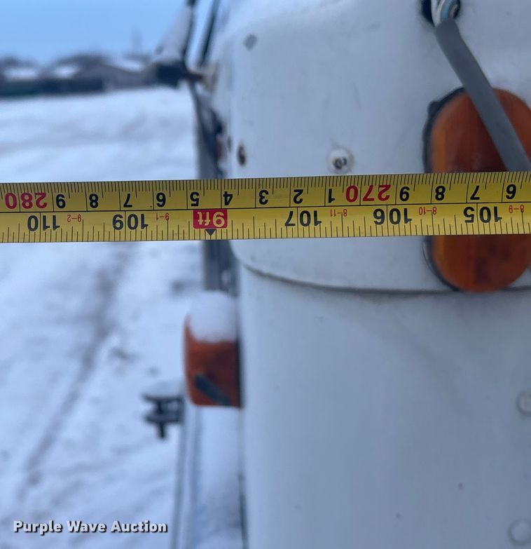 image for item DK0202 2002 Peterbilt 320 roll-off container truck