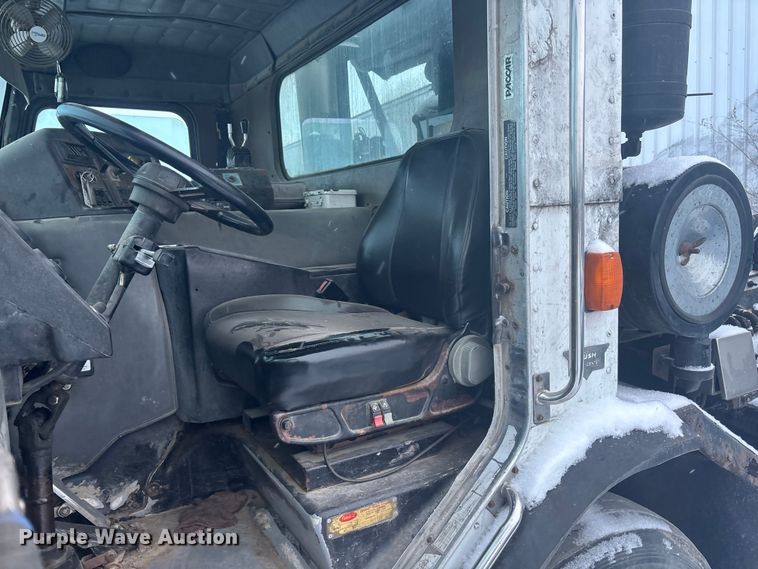 image for item DK0202 2002 Peterbilt 320 roll-off container truck