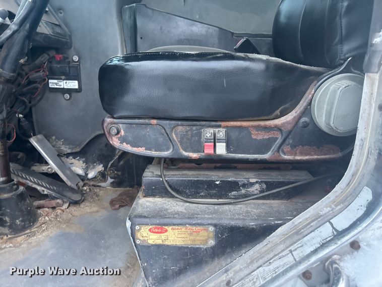 image for item DK0202 2002 Peterbilt 320 roll-off container truck