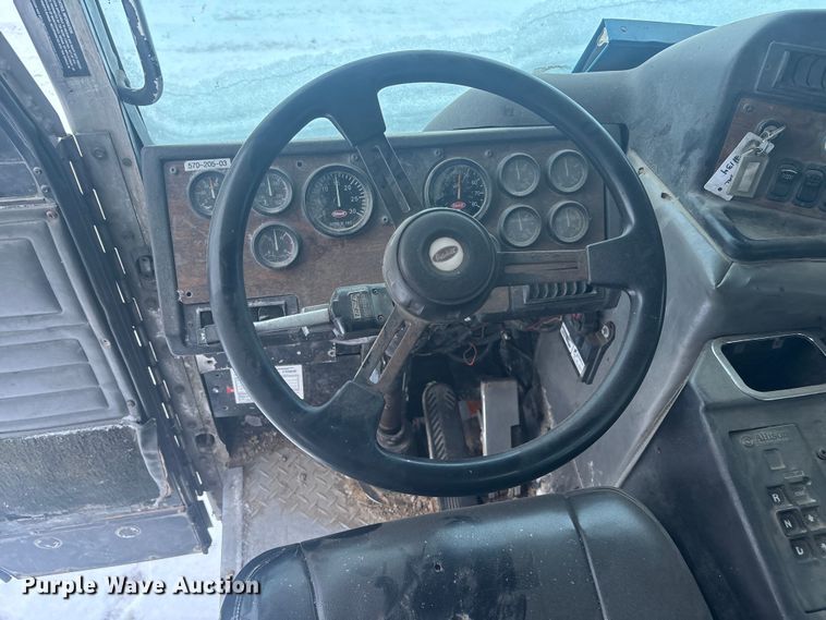 image for item DK0202 2002 Peterbilt 320 roll-off container truck