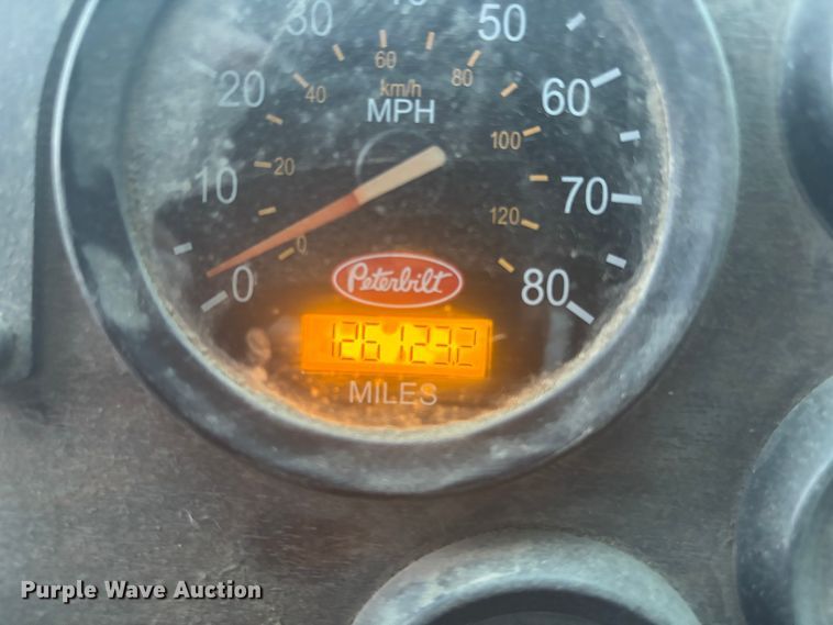 image for item DK0202 2002 Peterbilt 320 roll-off container truck