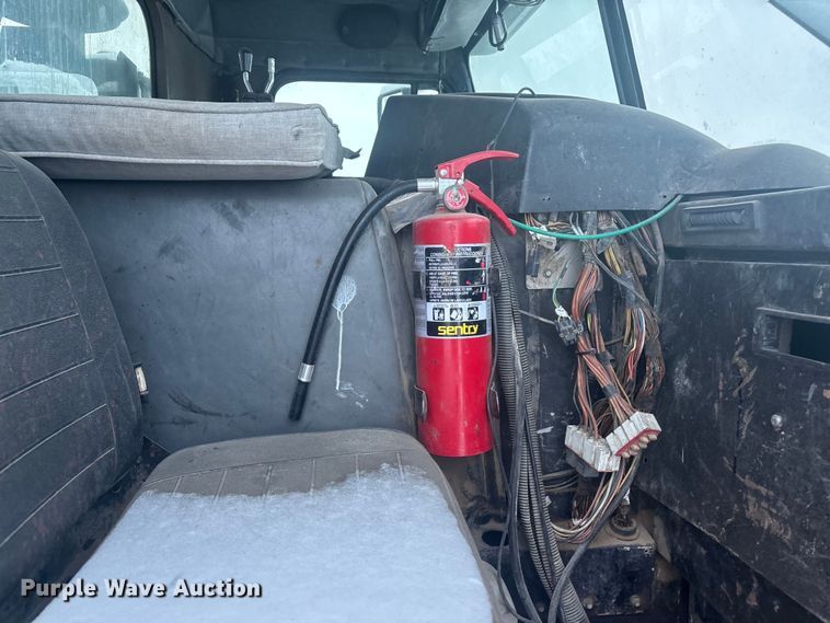 image for item DK0202 2002 Peterbilt 320 roll-off container truck