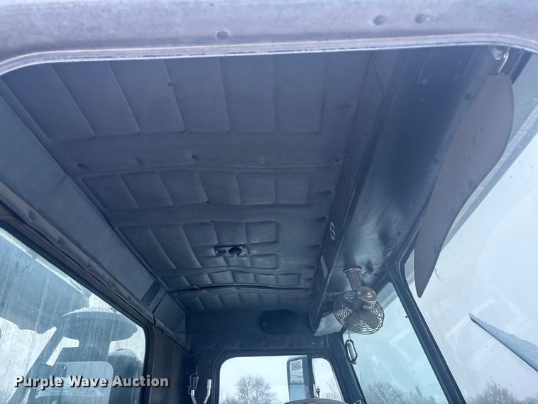 image for item DK0202 2002 Peterbilt 320 roll-off container truck