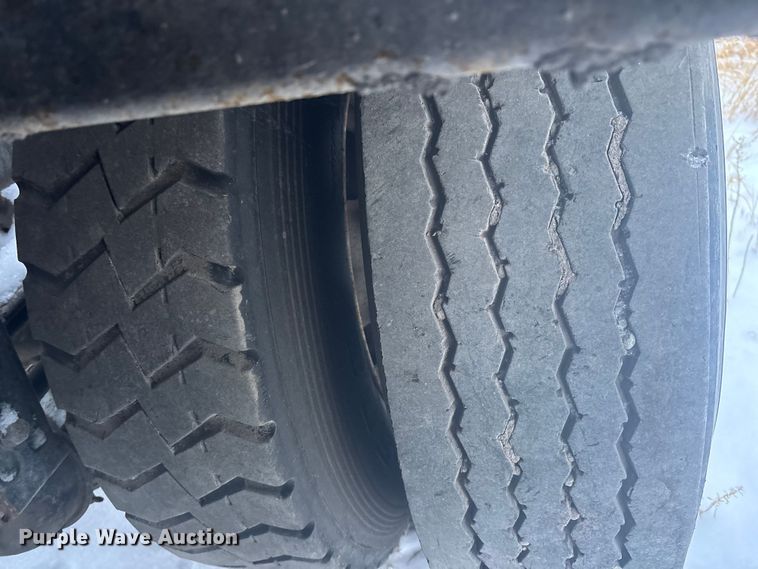 image for item DK0202 2002 Peterbilt 320 roll-off container truck