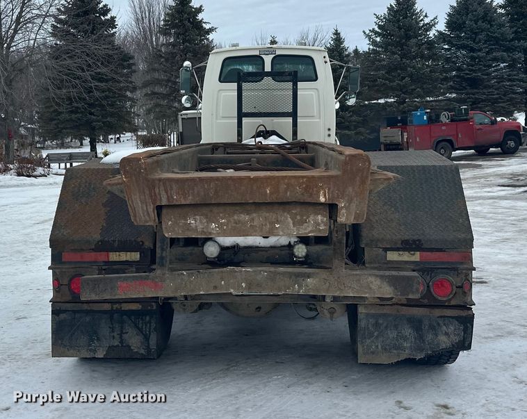 image for item DT6494 1999 Sterling L9513 roll-off container truck