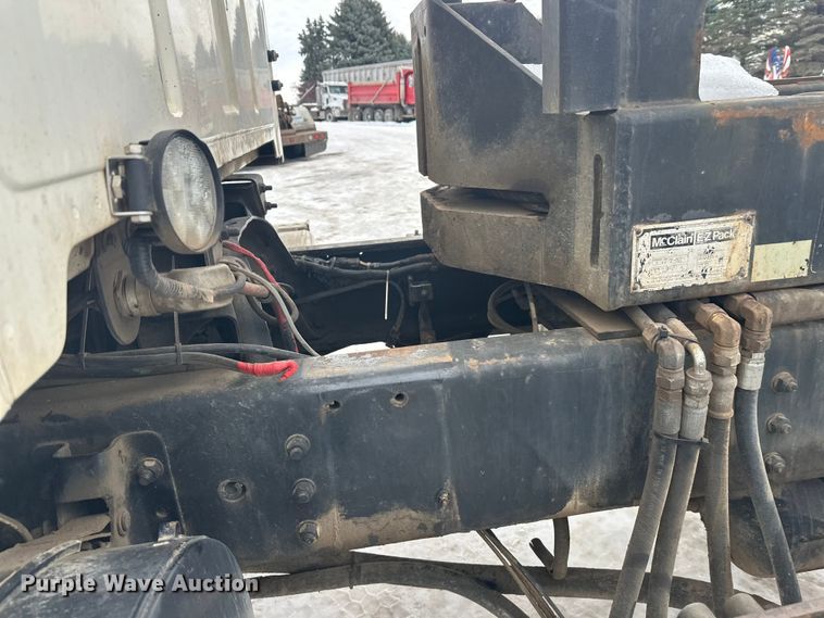 image for item DT6494 1999 Sterling L9513 roll-off container truck