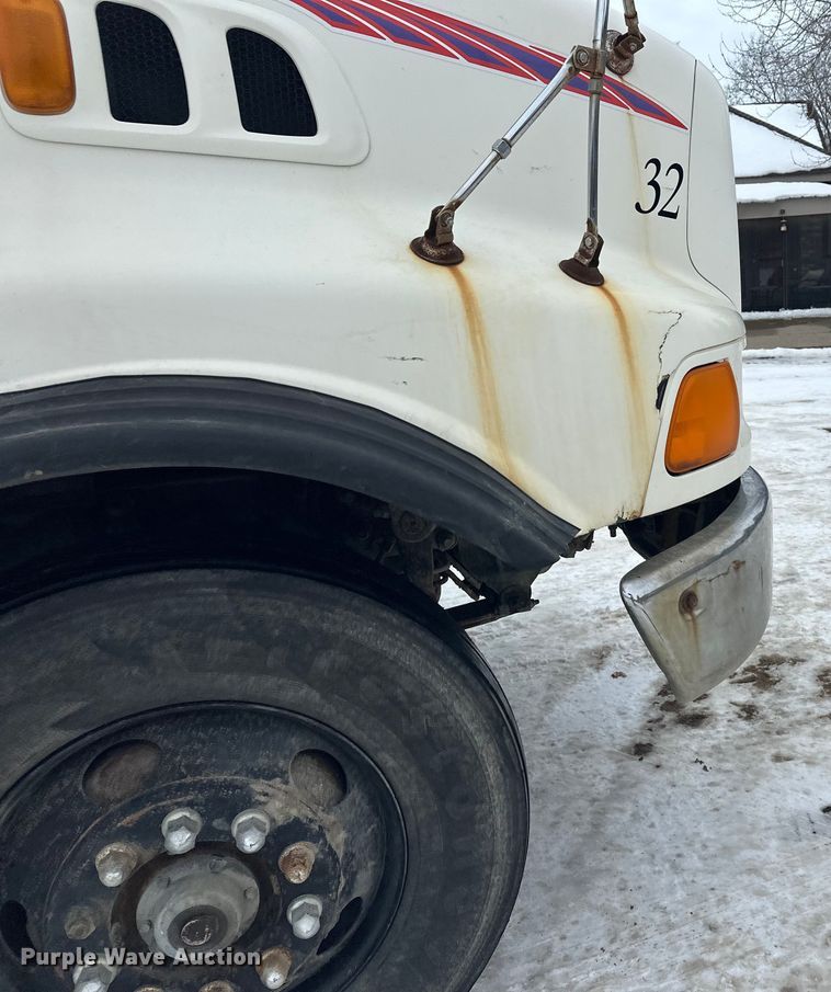 image for item DT6494 1999 Sterling L9513 roll-off container truck