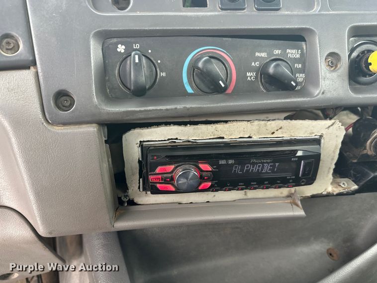 image for item DT6494 1999 Sterling L9513 roll-off container truck