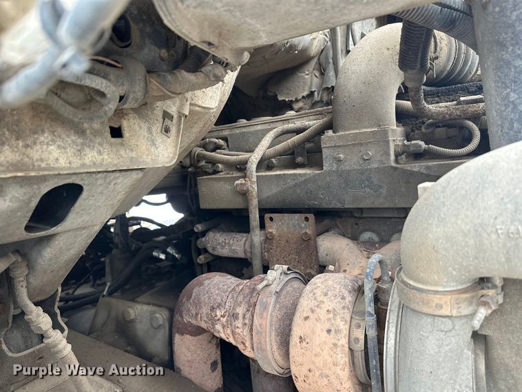 image for item DT6494 1999 Sterling L9513 roll-off container truck