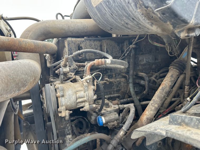 image for item DT6494 1999 Sterling L9513 roll-off container truck