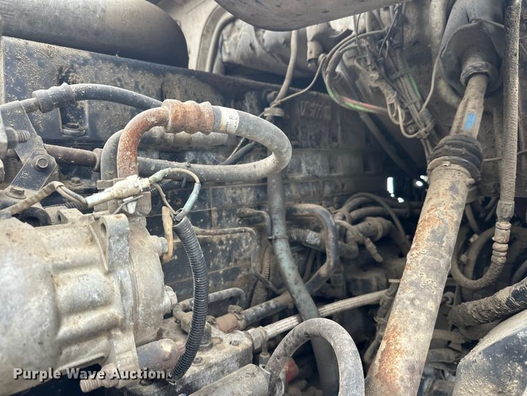 image for item DT6494 1999 Sterling L9513 roll-off container truck