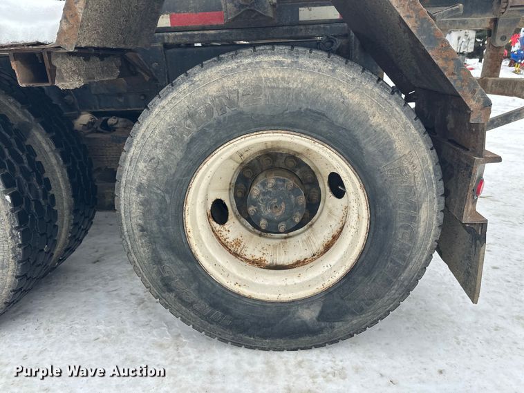 image for item DT6494 1999 Sterling L9513 roll-off container truck