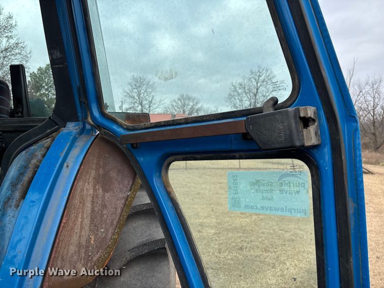 image for item FI1542 Ford 7710 MFWD tractor