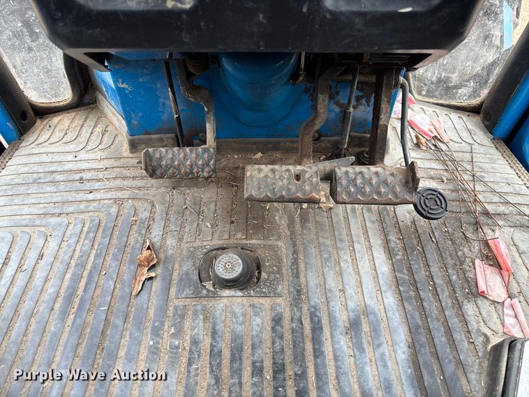 image for item FI1542 Ford 7710 MFWD tractor