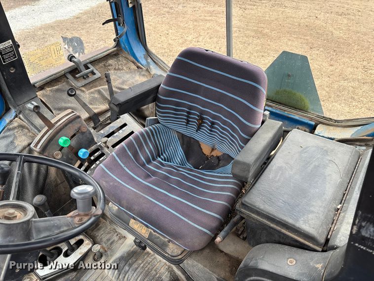 image for item FI1542 Ford 7710 MFWD tractor