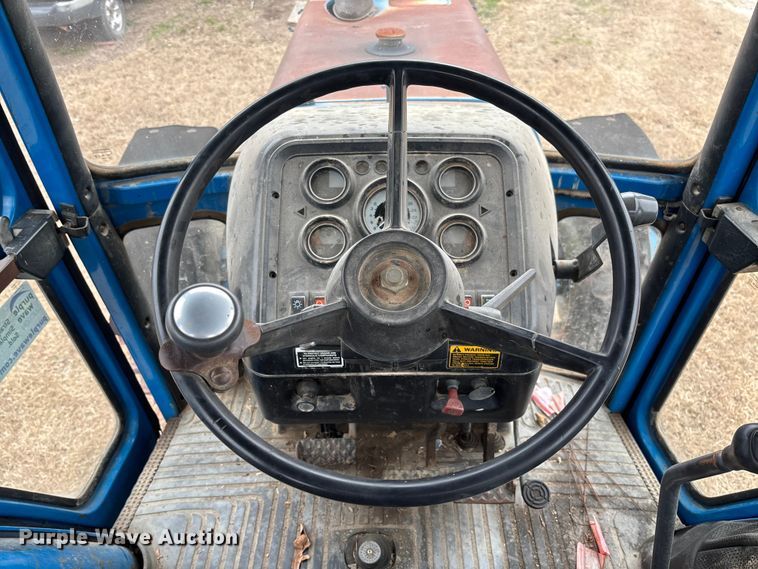 image for item FI1542 Ford 7710 MFWD tractor