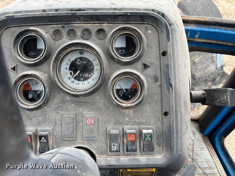 image for item FI1542 Ford 7710 MFWD tractor