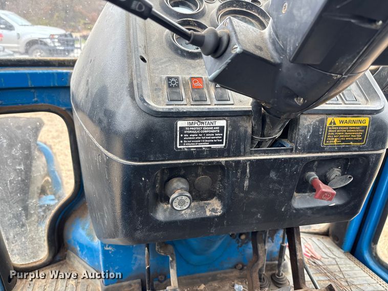 image for item FI1542 Ford 7710 MFWD tractor