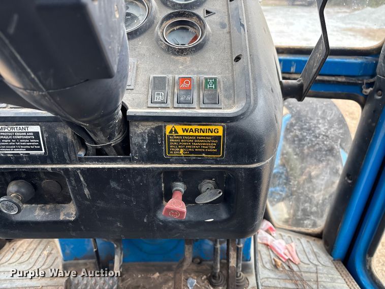 image for item FI1542 Ford 7710 MFWD tractor