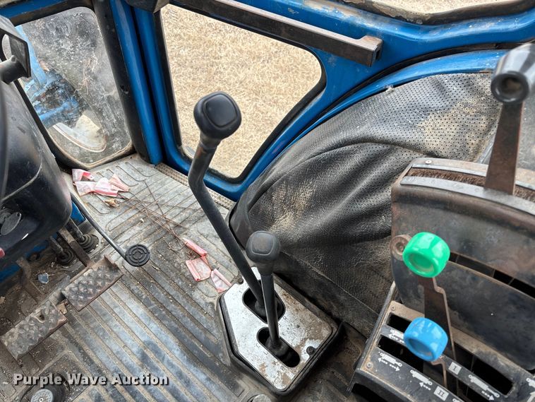 image for item FI1542 Ford 7710 MFWD tractor