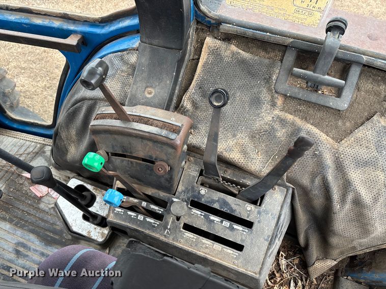 image for item FI1542 Ford 7710 MFWD tractor