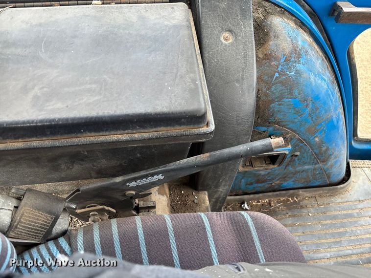 image for item FI1542 Ford 7710 MFWD tractor