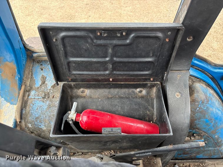 image for item FI1542 Ford 7710 MFWD tractor