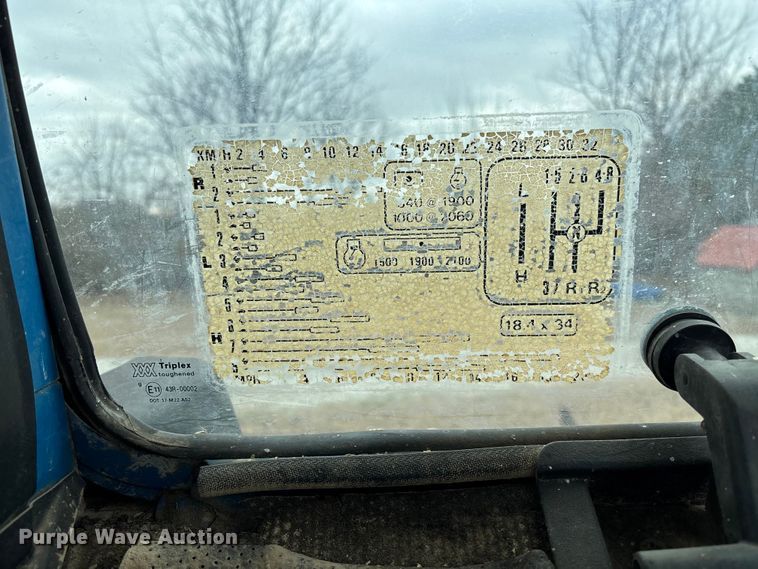 image for item FI1542 Ford 7710 MFWD tractor