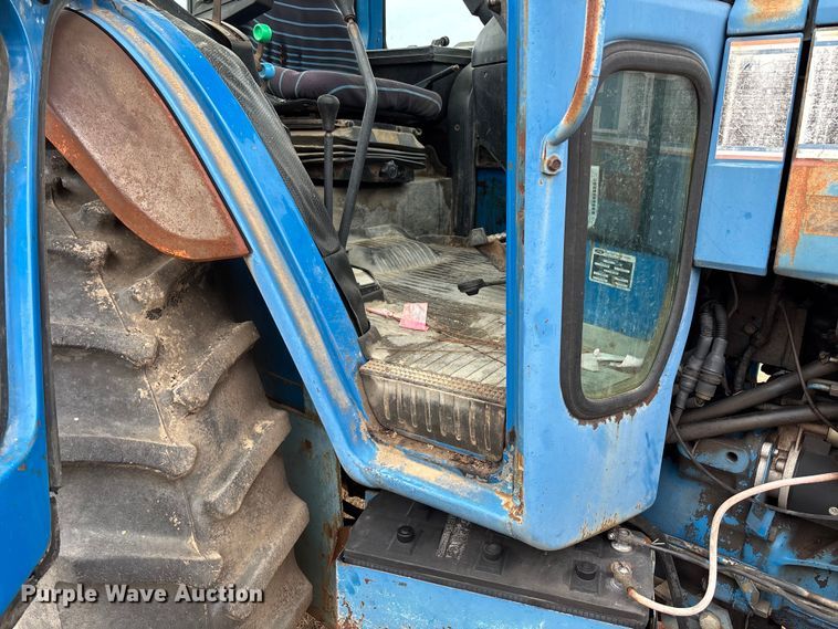 image for item FI1542 Ford 7710 MFWD tractor