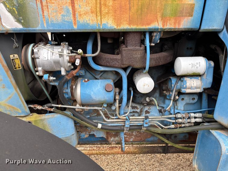 image for item FI1542 Ford 7710 MFWD tractor