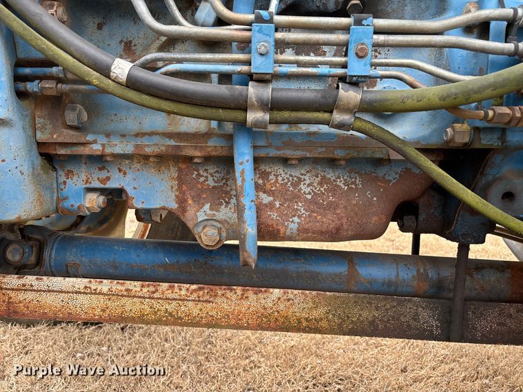 image for item FI1542 Ford 7710 MFWD tractor