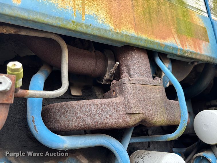 image for item FI1542 Ford 7710 MFWD tractor