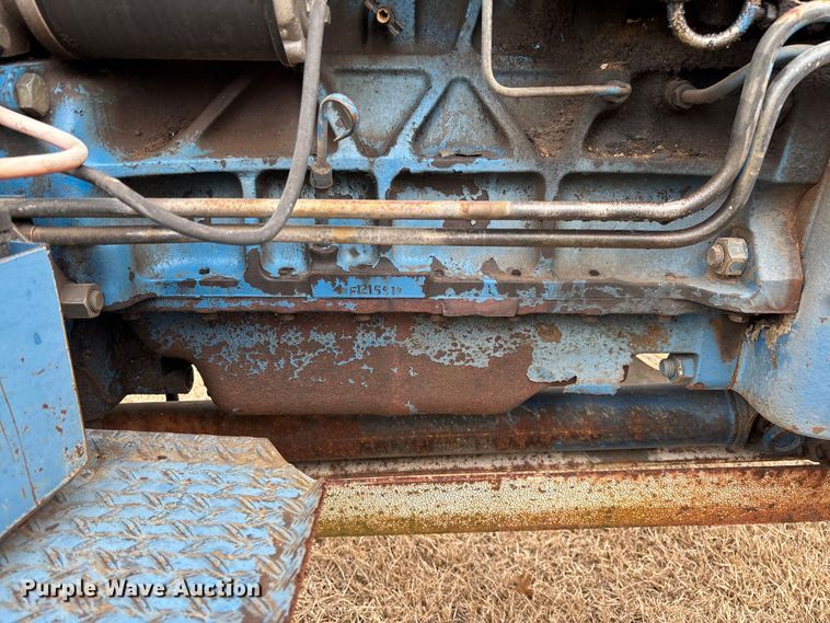 image for item FI1542 Ford 7710 MFWD tractor